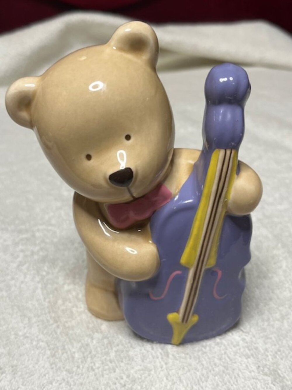 VTG Ceramic Brown Teddy Bear Coin Bank Holding a Purple Cello Collectible 4.75"